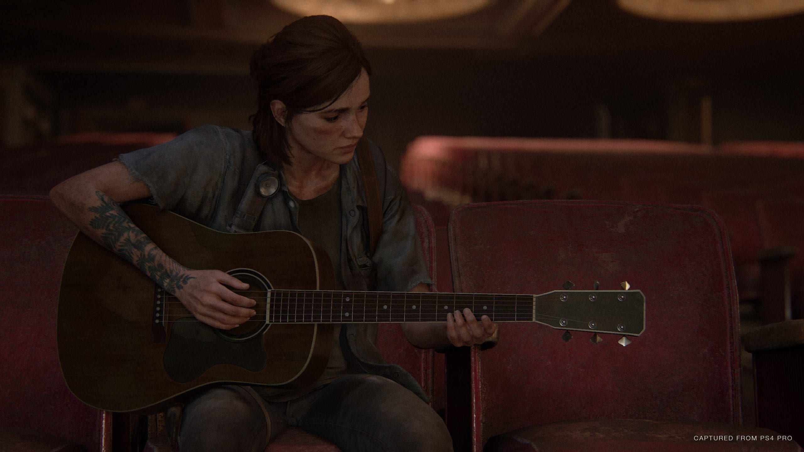 Ellie playing guitar TLOU2