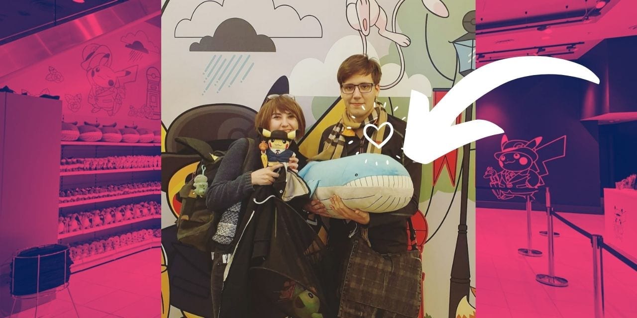 Author next to a huge Wailord plush at the pop-up pokemon centre