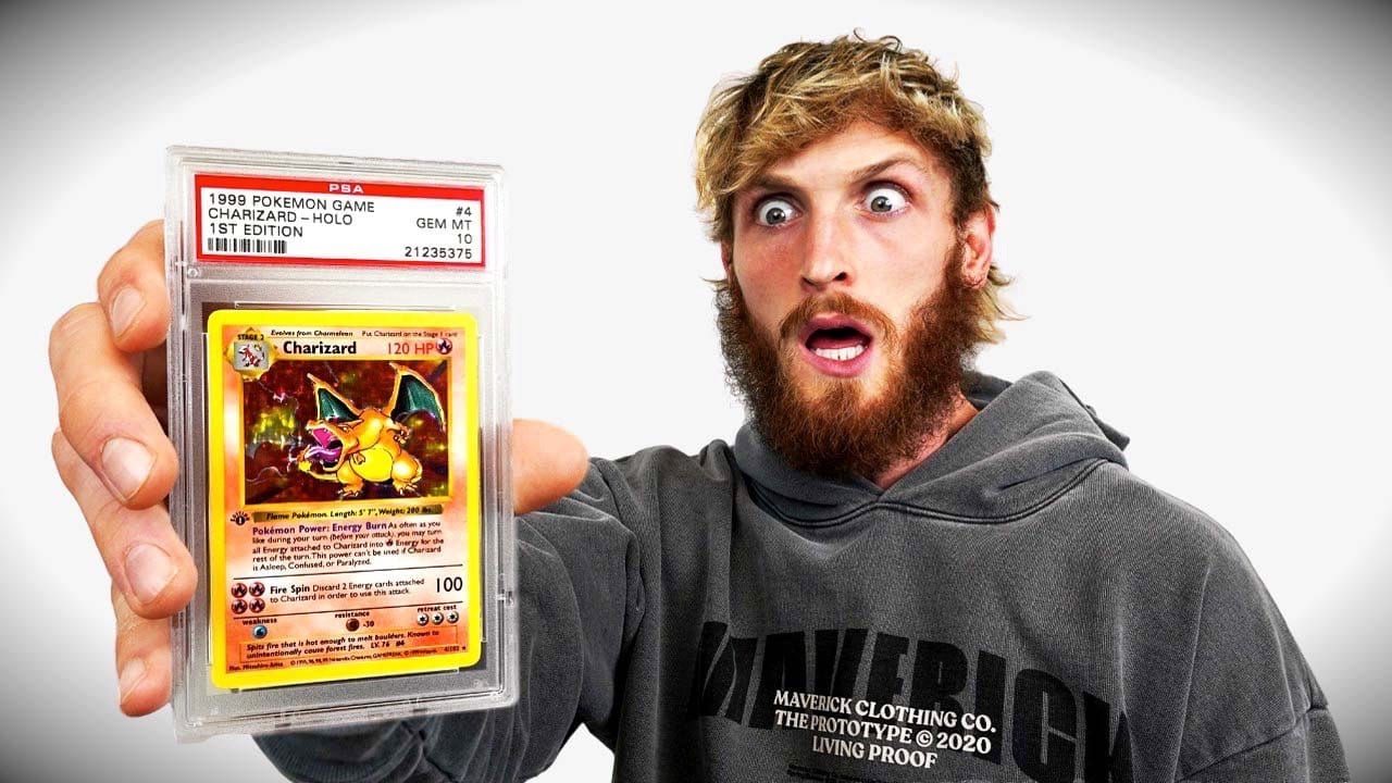 logan paul with pokemon card