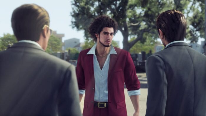 An image of Ichiban from Yakuza: Like a Dragon talking to 2 other characters.